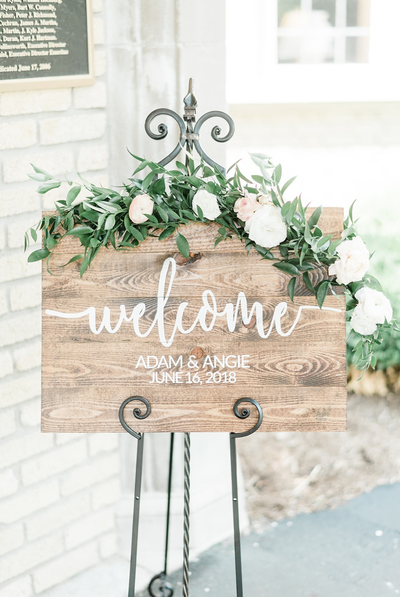 Wooden Welcome Sign with flowers