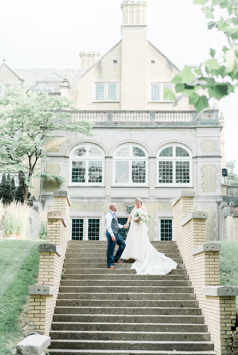 Bride and Groom on steps at Laurel Hall Indianapolis