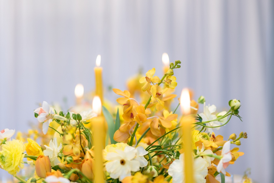 Yellow centerpiece with yellow candles