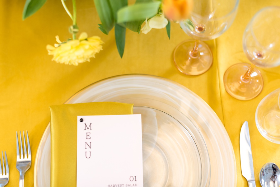 yellow table setting with modern menu